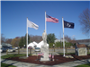 Parks and Recreation Flags and Statue